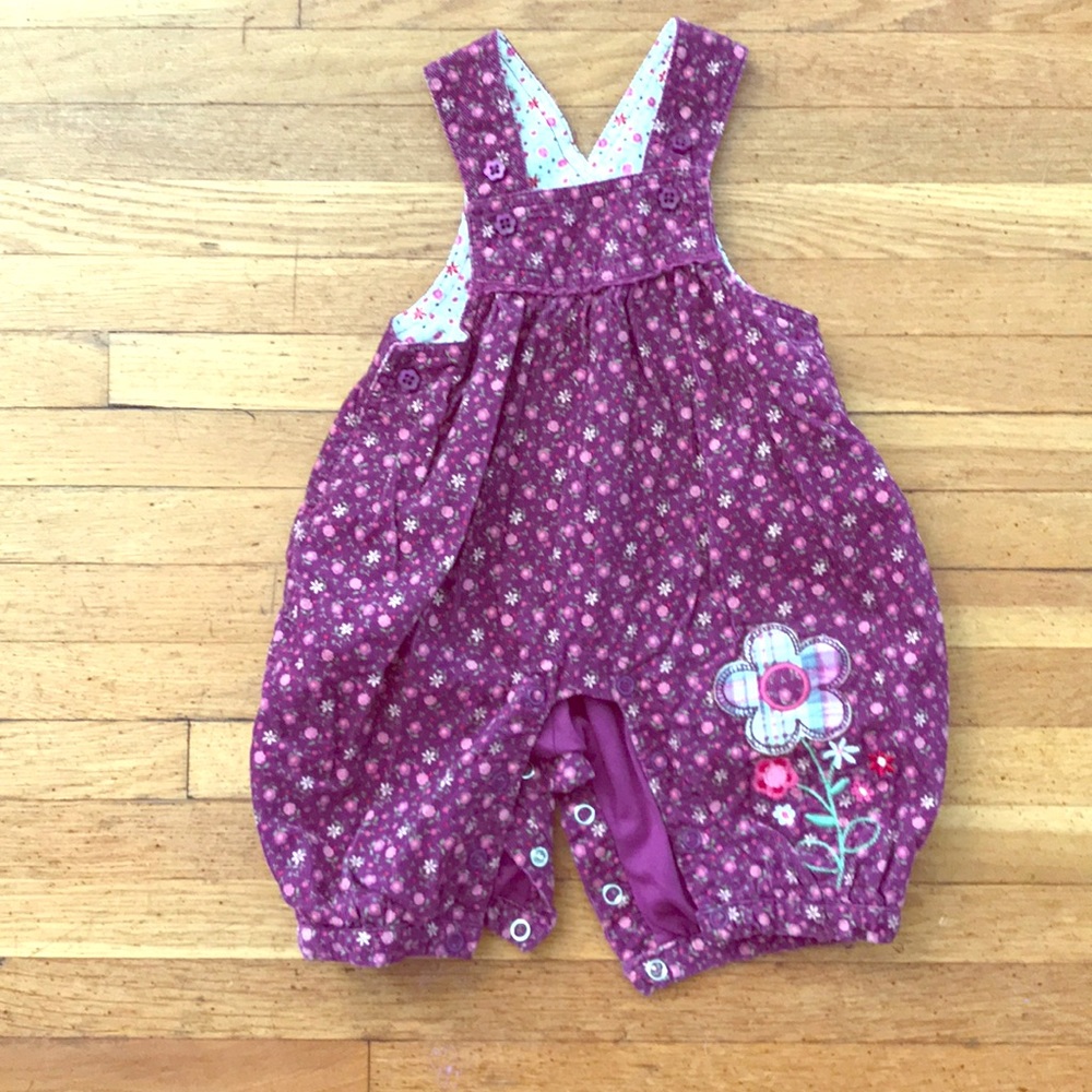 A Pink floral corduroy jumpsuit